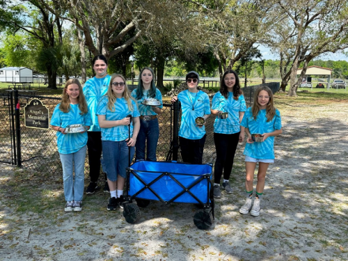 Group of youth volunteers by Angel's Memorial Park
